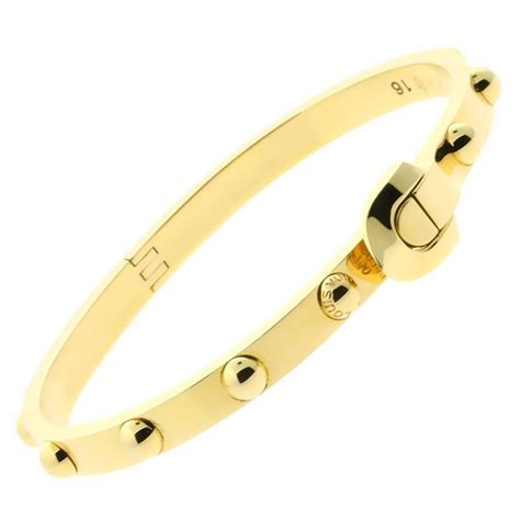 louis vuitton gold cuff bracelet|louis vuitton gold charm bracelet.